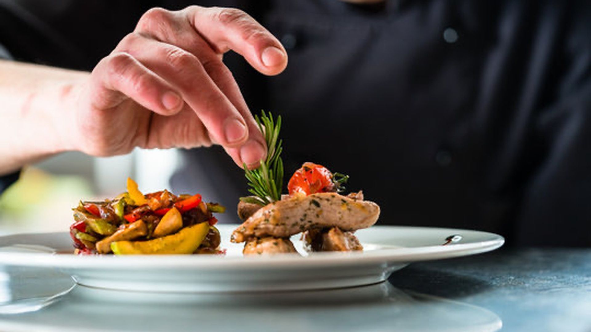 Chef plating a gourmet meal at the Costa Rica retreat