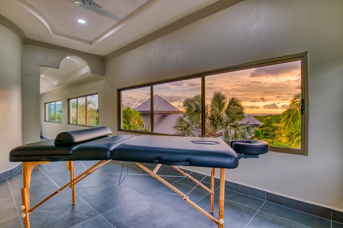 Massage and wellness room with sunset ocean view
